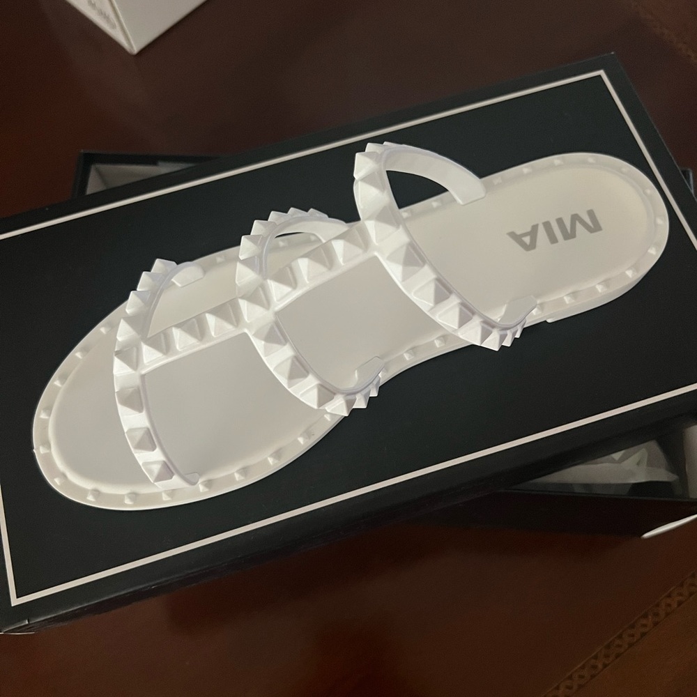 New white MIA sandals.
